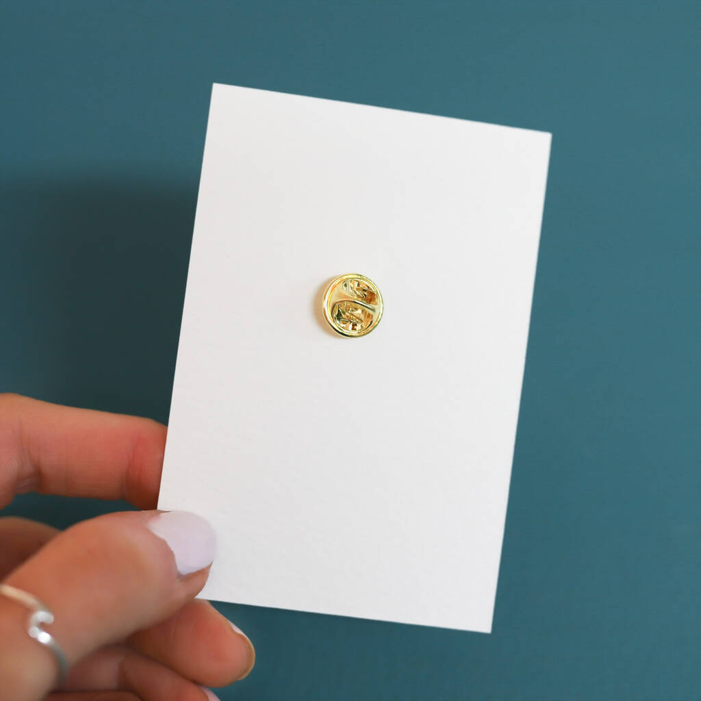 Here we see the plain back of the card displaying the back of the nickel pin.